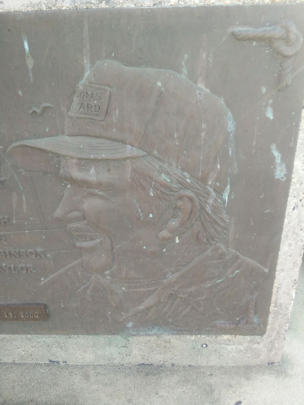 Elmer J. 'Al' Larson memorial cannon and plaque